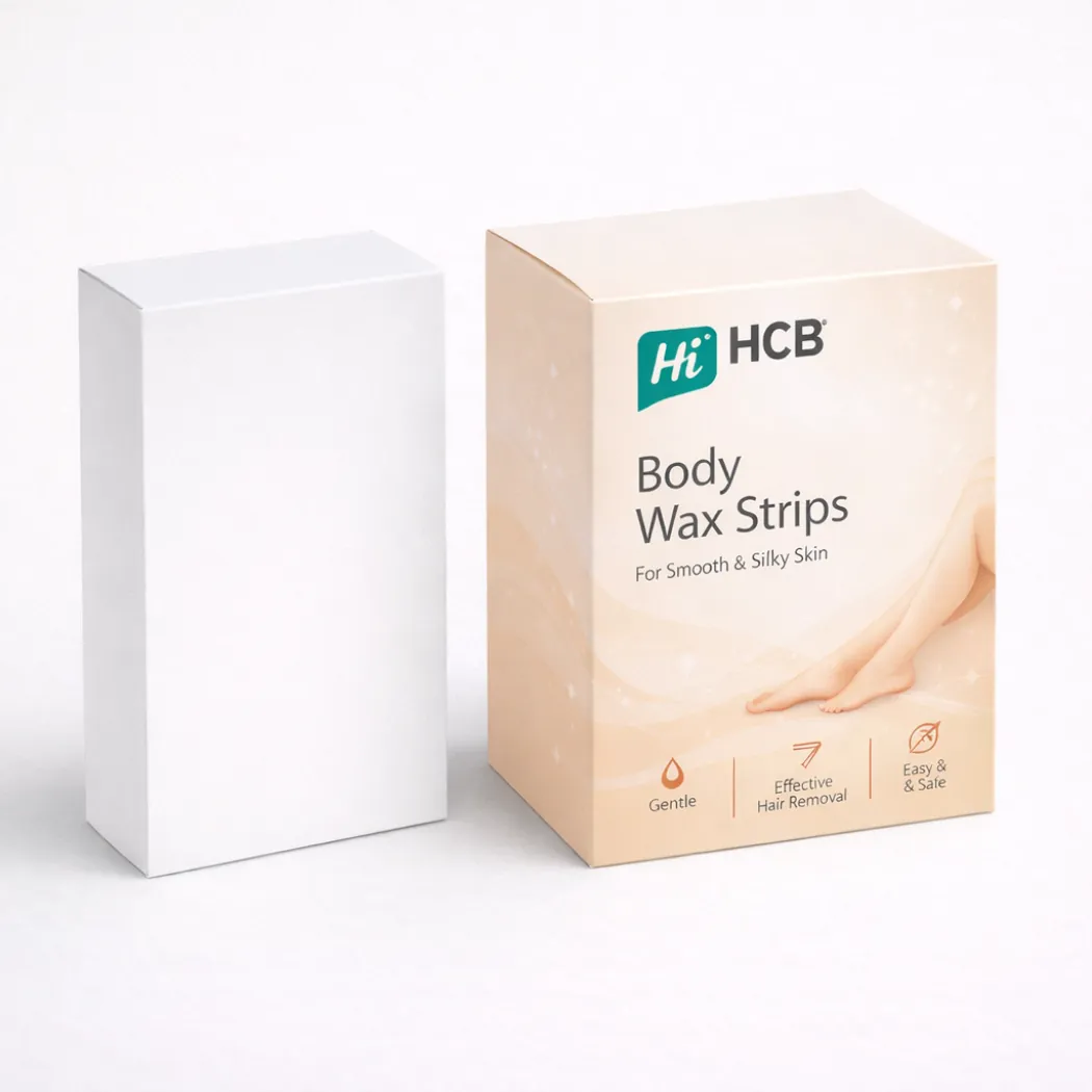 A pair of rectangular product boxes- one blank white and one featuring peach-coloured skincare branding- class=